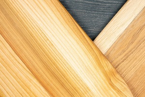 background and texture of smooth treated wood close-up diagonally